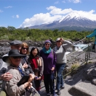 Some of the group at Petrohue waterfalls (Chile lake district with Osorno volcano in background)