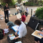 Group-doing-a-pen-and-wash-at-Kuranda